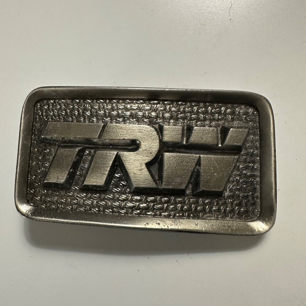 Vintage TRW Auto Transport Aerospace Advertising 3.25 x 1.75”  Belt Buckle lot B